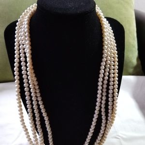 Cream cultured pearls 100 inches